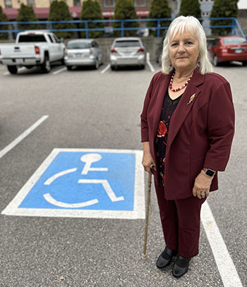 RDKB Board Chair Linda Worley in Car Park.
