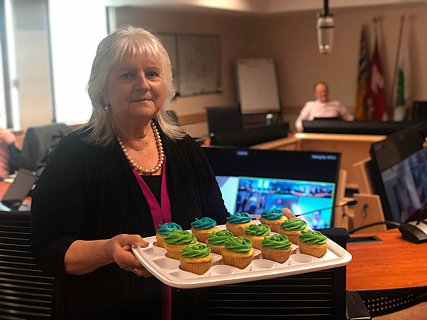 RDKB Board Chair and Area B Director Linda Worley celebrating with staff at RDKBs recent birthday
