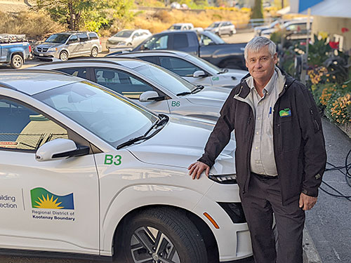 Brian Champlin and the EVs at the RDKBs Trail Headquarters